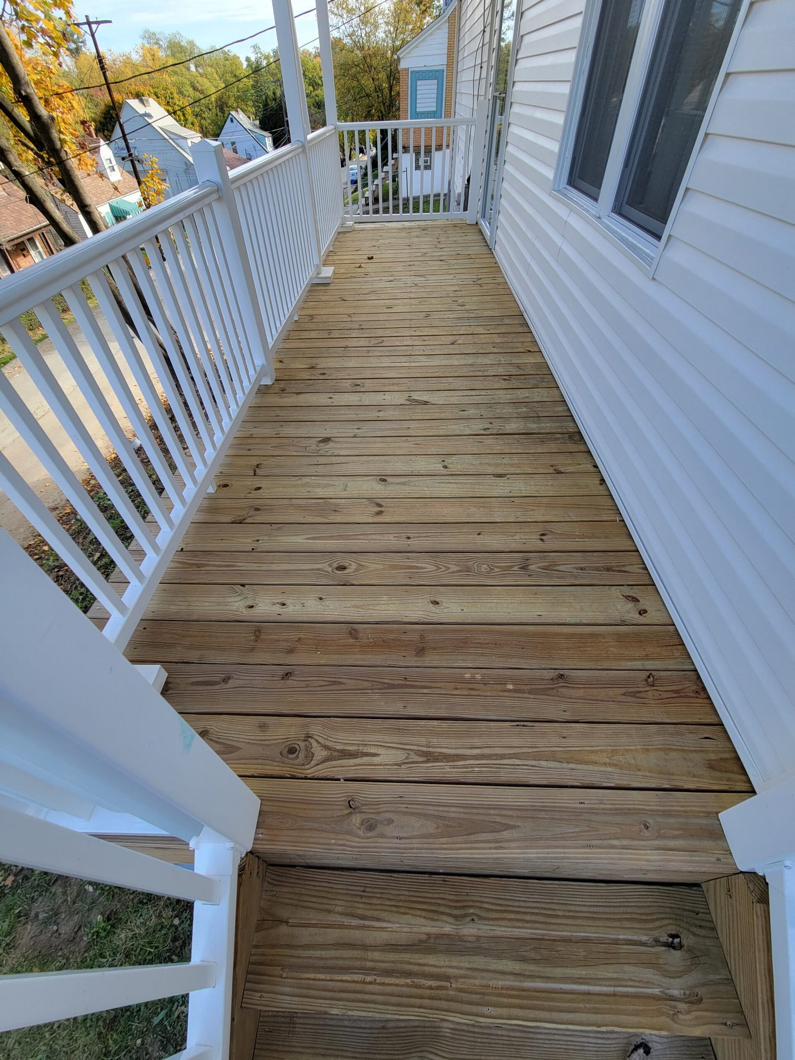 Freshly pressure washed wood deck and railing, Pittsburgh PA
