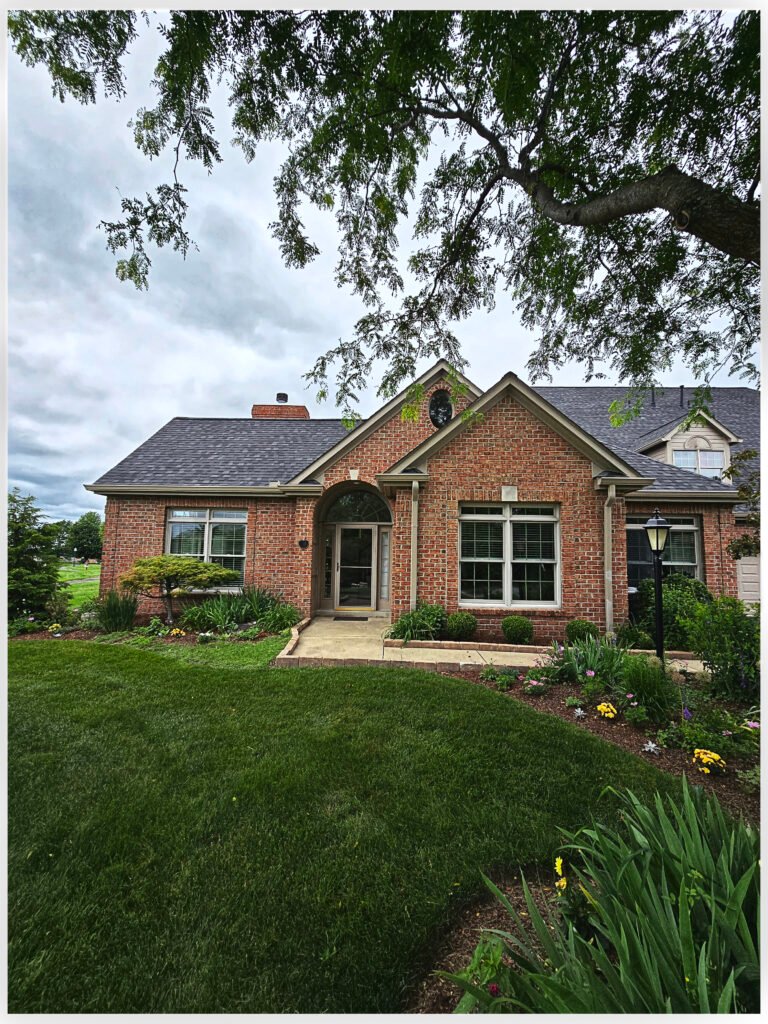 Brick ranch home exterior with painted cream trim, Cranberry Township PA
