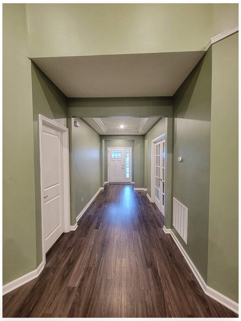 Long hallway painted sage green with dark wood flooring, Mt. Lebanon PA
