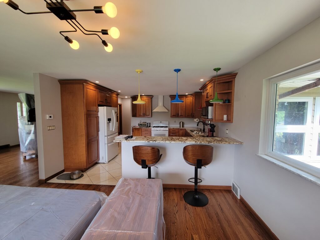 Freshly painted kitchen and living area with gray walls and white ceiling, Cranberry Township PA