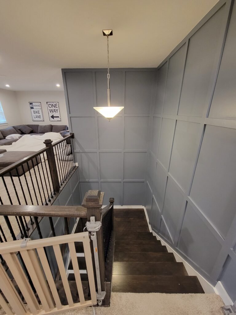 Stairway with blue-gray board and batten wall paneling, Upper St. Clair PA